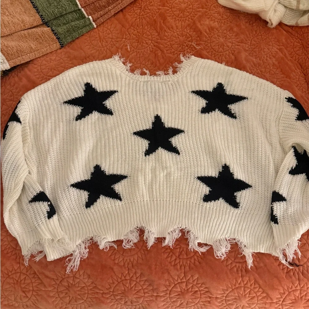Distressed Oversized White Sweater with Black Stars - Picture 3 of 3